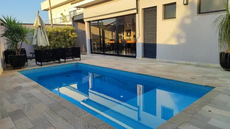 imagem 1 - Casa nova com piscina em condomínio imagem 1 - Casa nova com piscina em condomínio