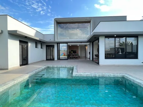 Casa térreas com amplo quintal e 4 suítes para comprar no condomínio Terras de Ártemis.

Logo na entrada da casa você vai encontrar uma sala, lavabo, cozinha e gourmet com chopeira tudo com vista para a piscina e o amplo quintal em gramado que faz dessa casa uma oportunidade para quem gosta de muito espaço e lazer.

São 4 suítes sendo uma master com amplo closet, sendo 3 com vista para a piscina.

Ampla lavanderia e 4 vagas de garagem, sendo 2 cobertas e 2 descobertas. 

 
